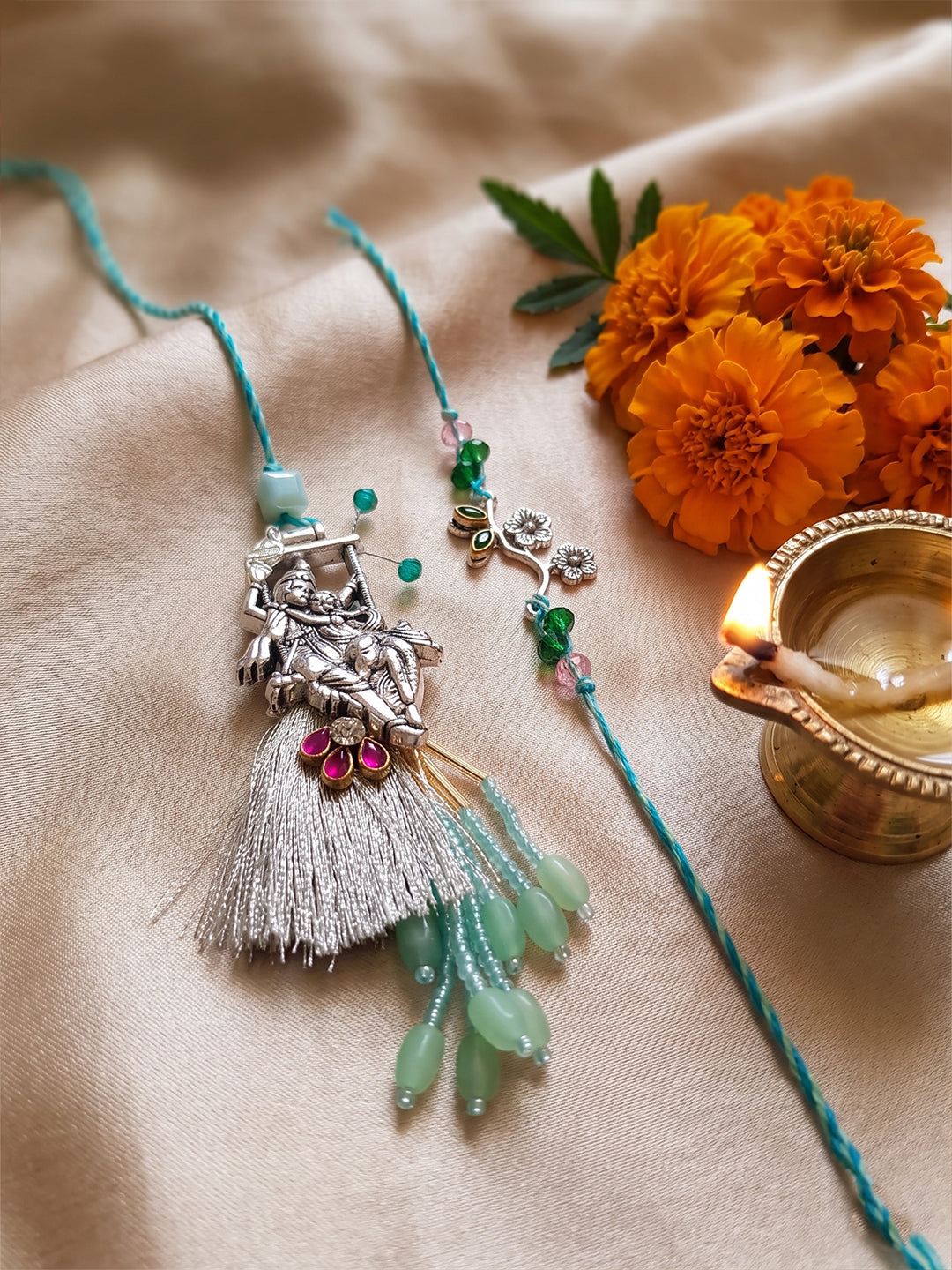 NVR Set of 2 Designer Religious Silver Toned Bhaiya Bhabhi Rakhi with Roli Chawal Chandan