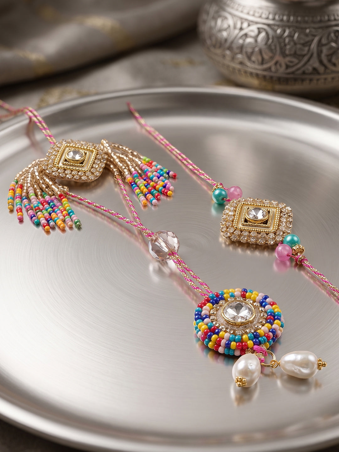 NVR Set of 2 White Artificial Stones Golden Toned Bhaiya Bhabhi Rakhi With Roli Chawal