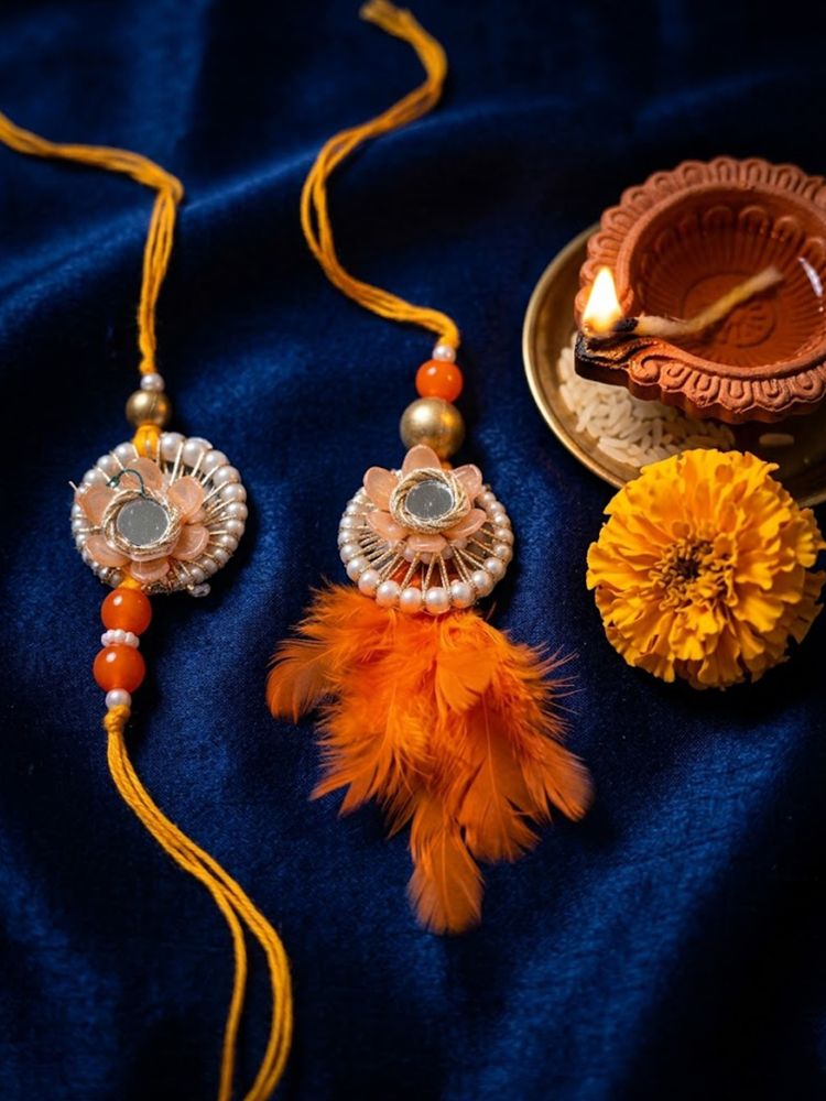 NVR Set of 4 Yellow Artificial Beads & White Pearls Bhaiya Bhabhi Rakhi With Roli Chawal