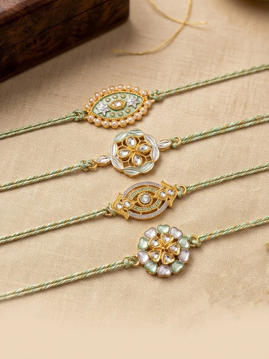 NVR Set of 4 White Artificial Stones & Green Thread Rakhi with Roli Chawal Chandan Mishri