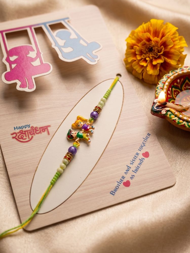 NVR Kids Multicolor Artificial Beads Thread Rakhi with Roli Chawal Chandan Chandan Mishri