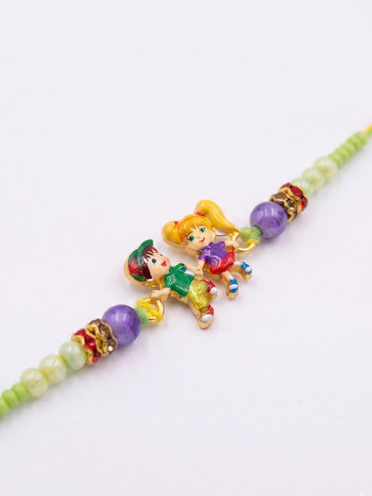 NVR Kids Multicolor Artificial Beads Thread Rakhi with Roli Chawal Chandan Chandan Mishri
