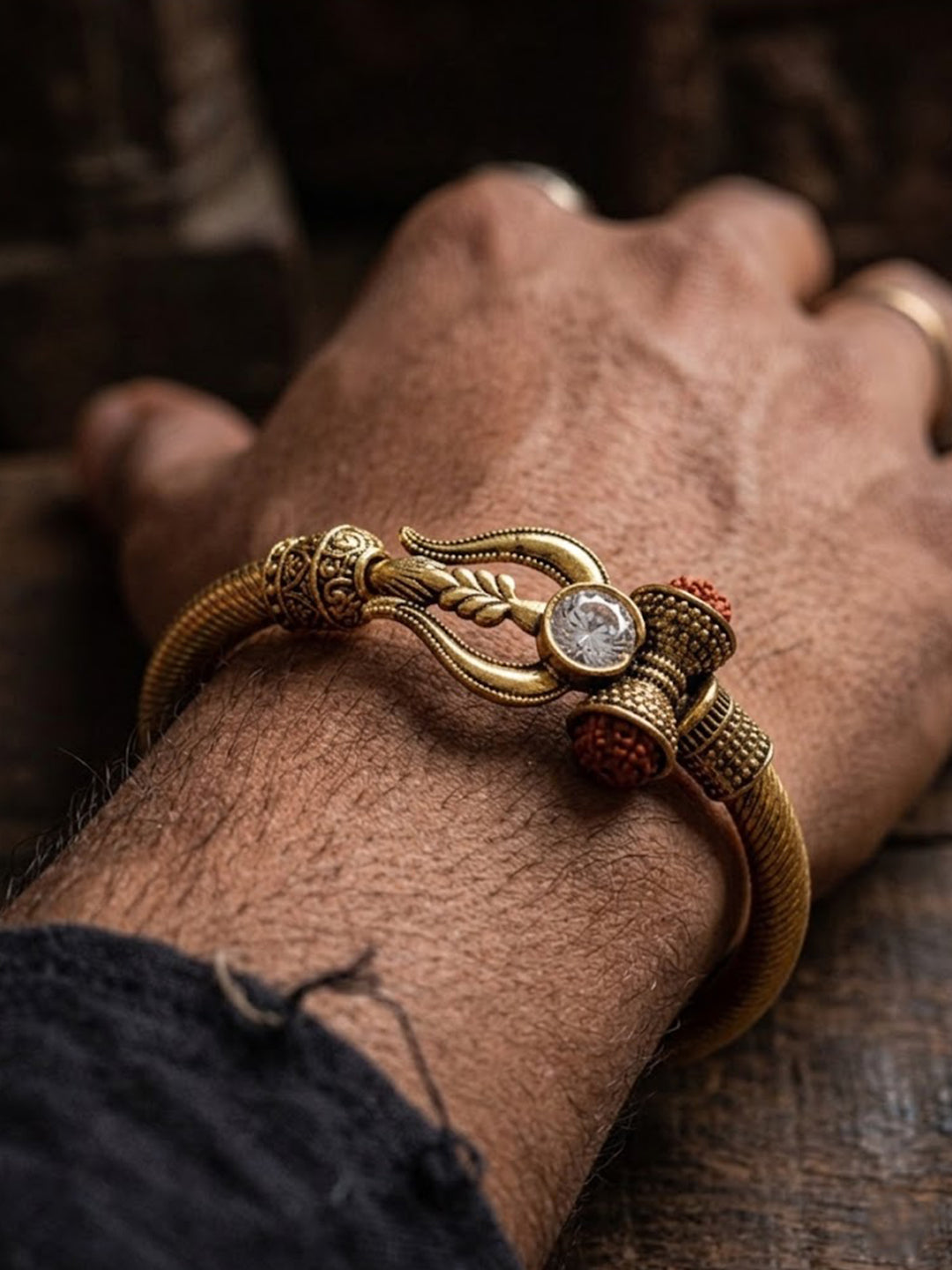 NVR Gold Plated Trishool Design Rudraksh Rakhi Bracelet with Roli Chawal Chandan Mishri