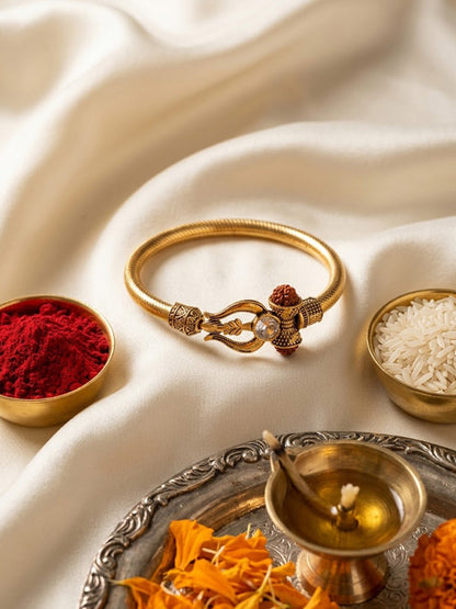 NVR Gold Plated Trishool Design Rudraksh Rakhi Bracelet with Roli Chawal Chandan Mishri