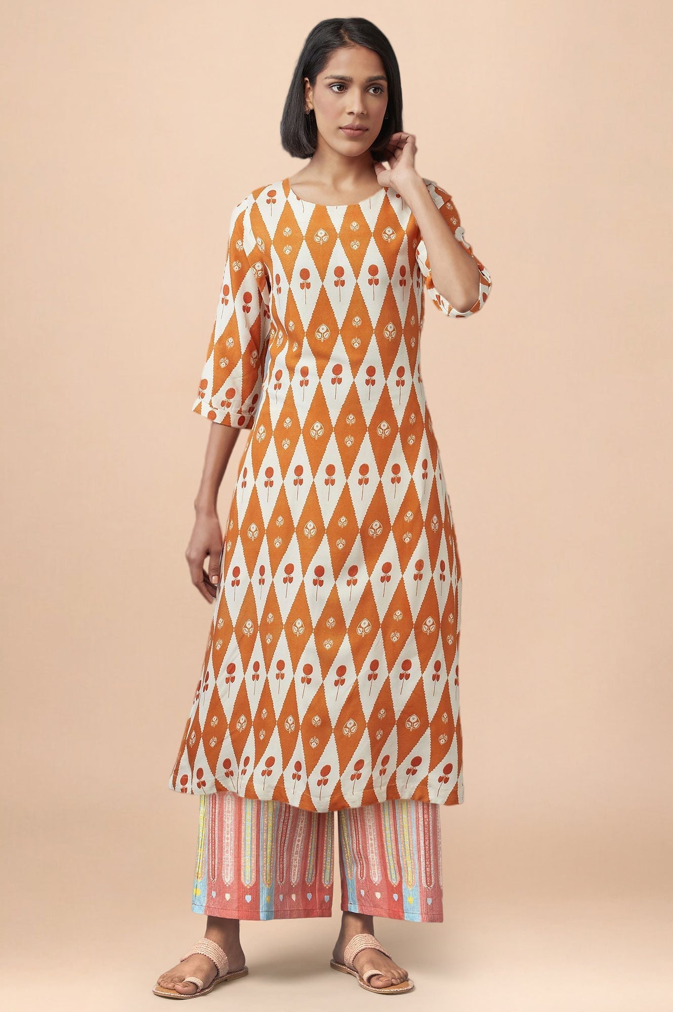 W for Woman Orange Floral Printed Rayon A-Line Kurta and Parallel Pant Set
