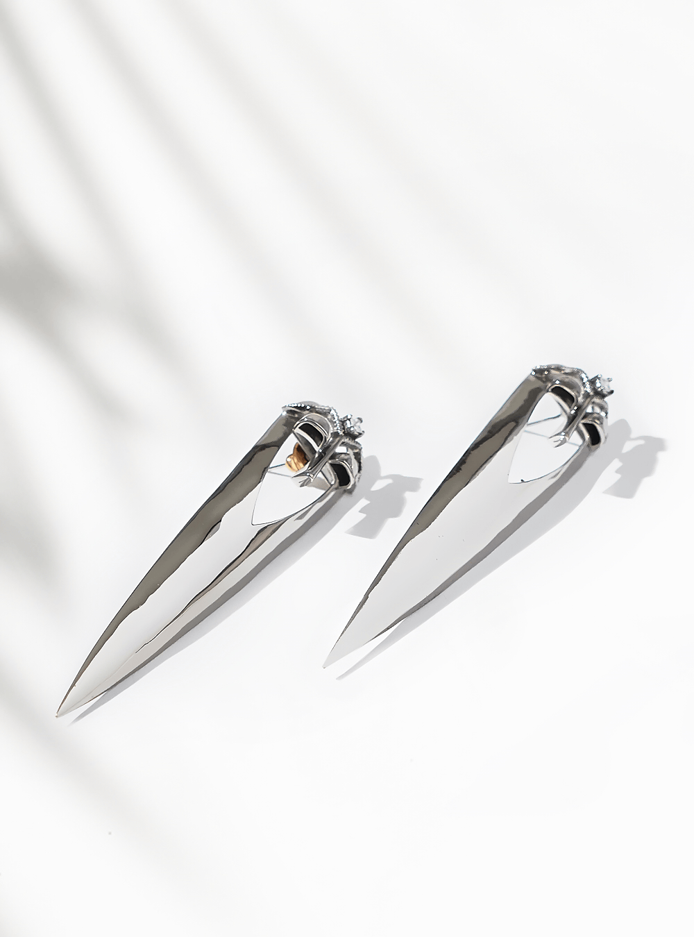 Gavi Spicule Earrings In Silver Finish
