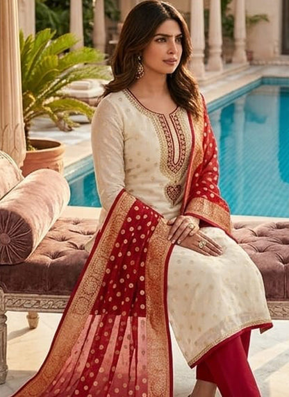 Vegaa Fashion Cream Embroidered salwar suit