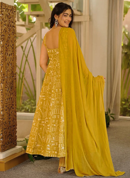 Vegaa Fashion Yellow Printed Muslin Salwar Suit