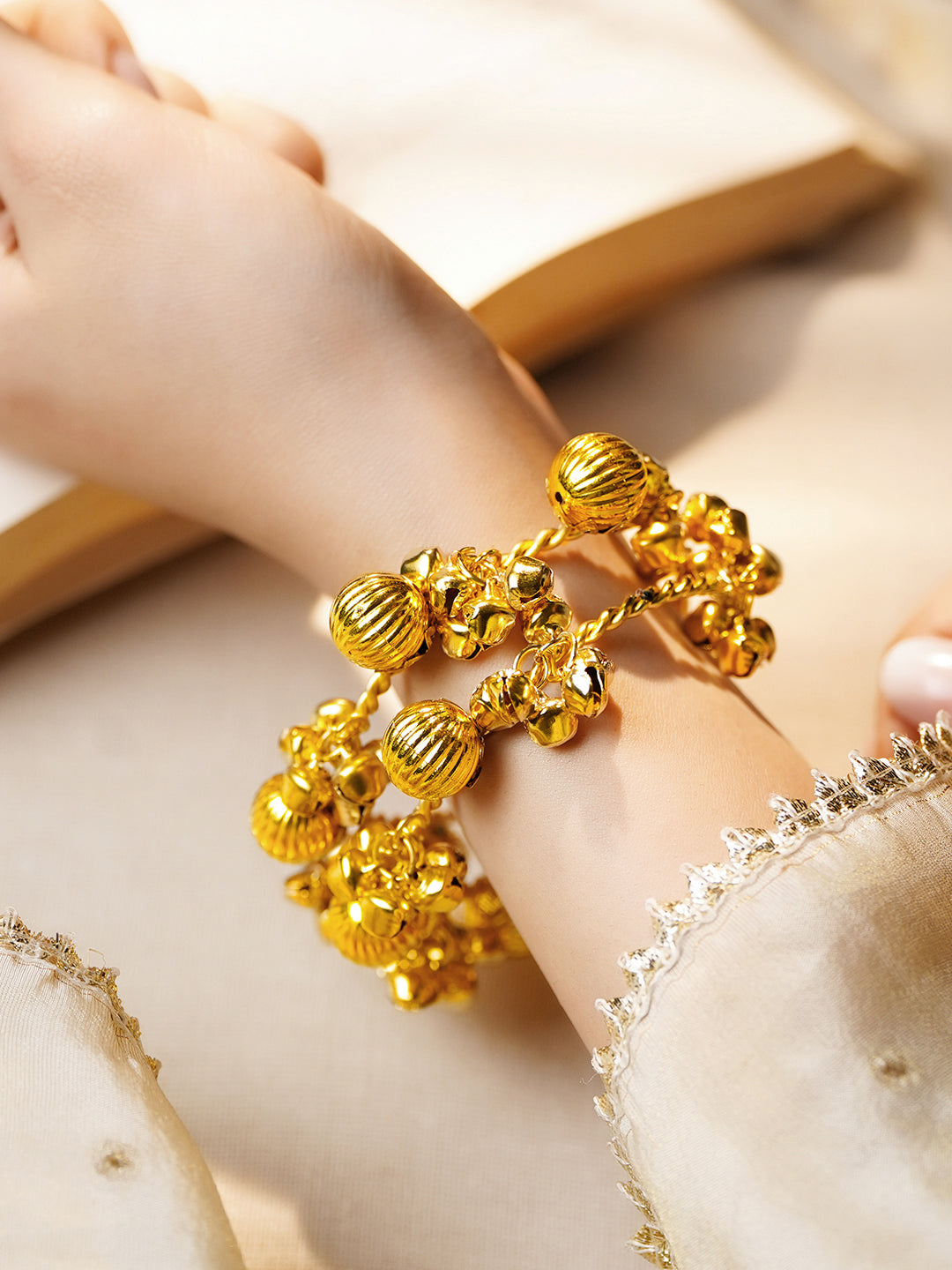 Gold Twisted Ghungroo Statement Bangles