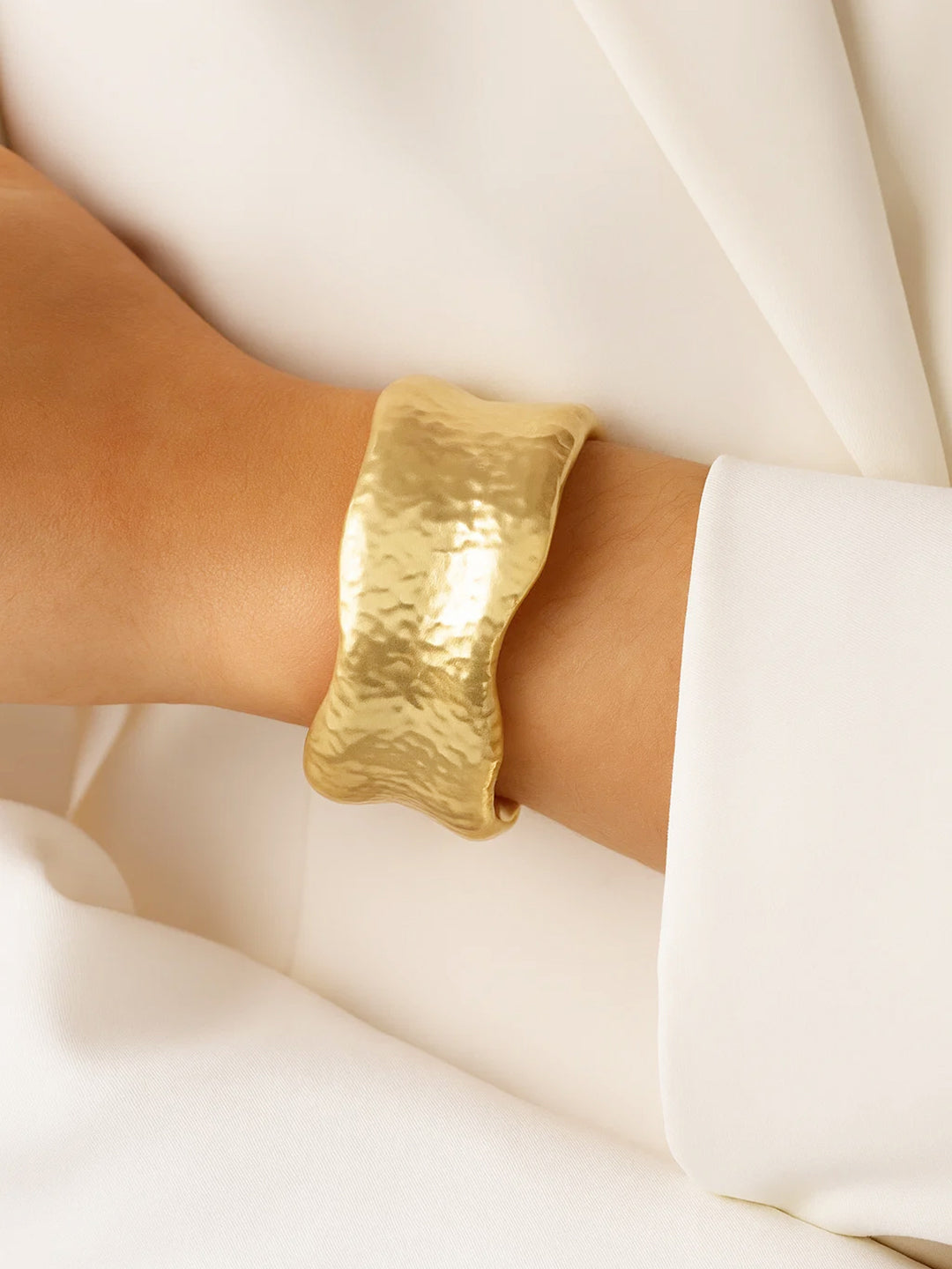 Gold Toned Sculpted Hammered Statement Bracelet