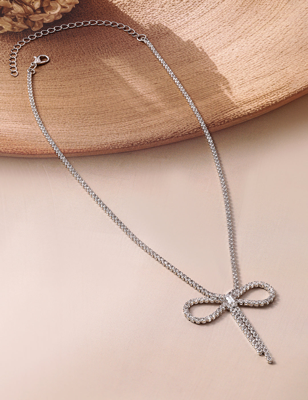 Ribbon Motif White Crystal Pendant Necklace