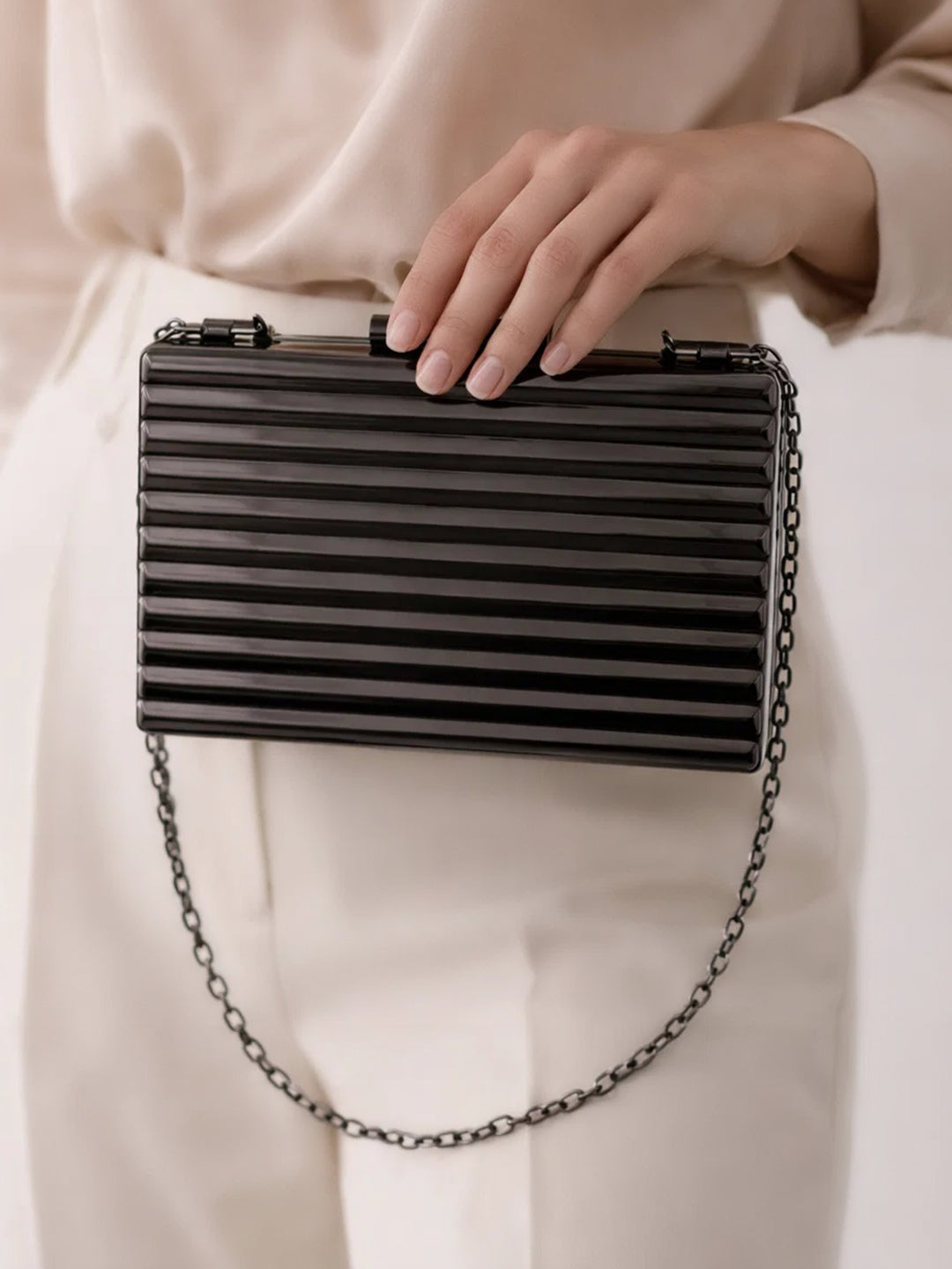 Midnight Gloss Ribbed Statement Clutch Bag