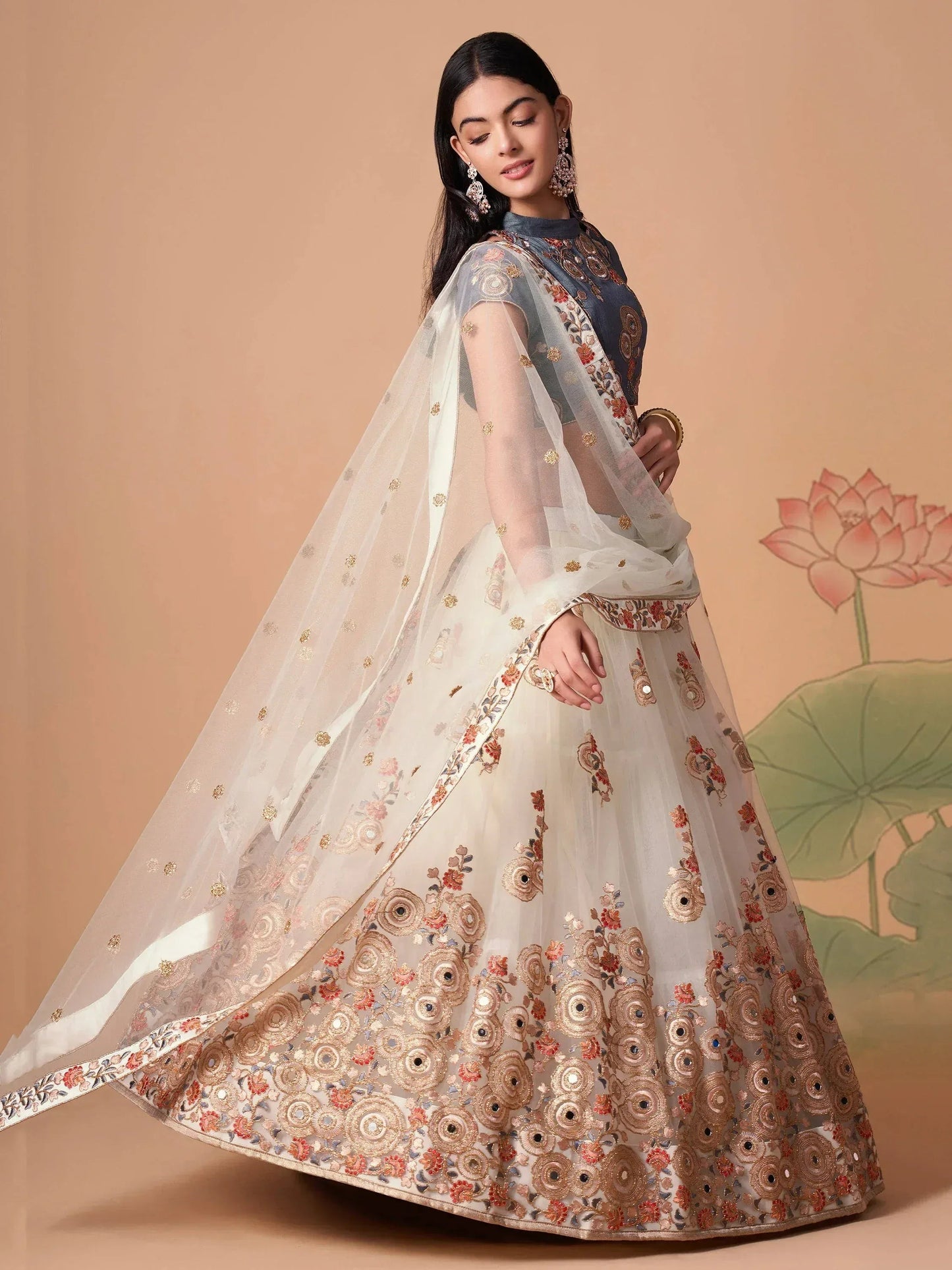 Tulsi Art Pretty Ivory Embroidered Net Party Wear Lehenga Choli