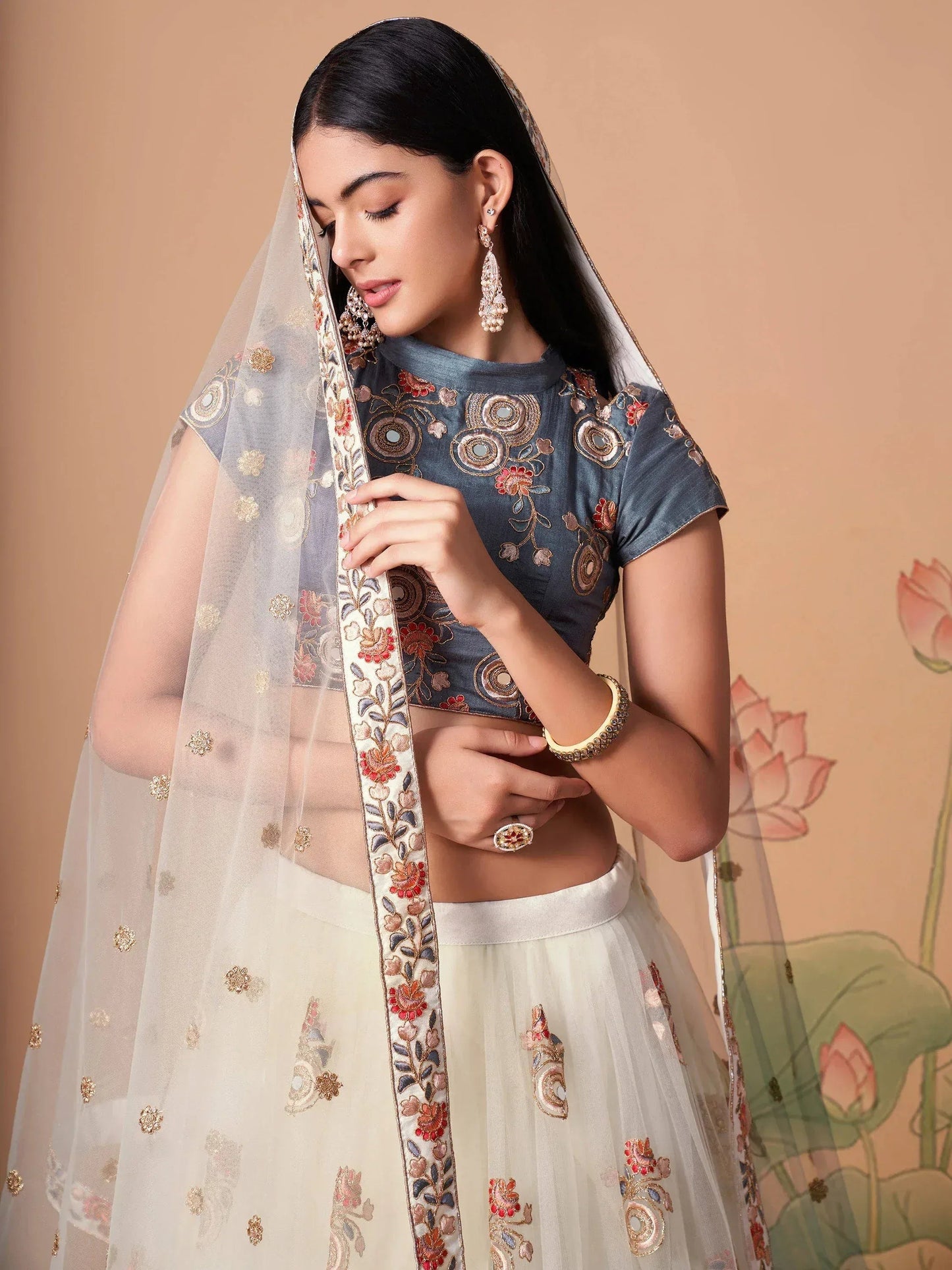 Tulsi Art Pretty Ivory Embroidered Net Party Wear Lehenga Choli