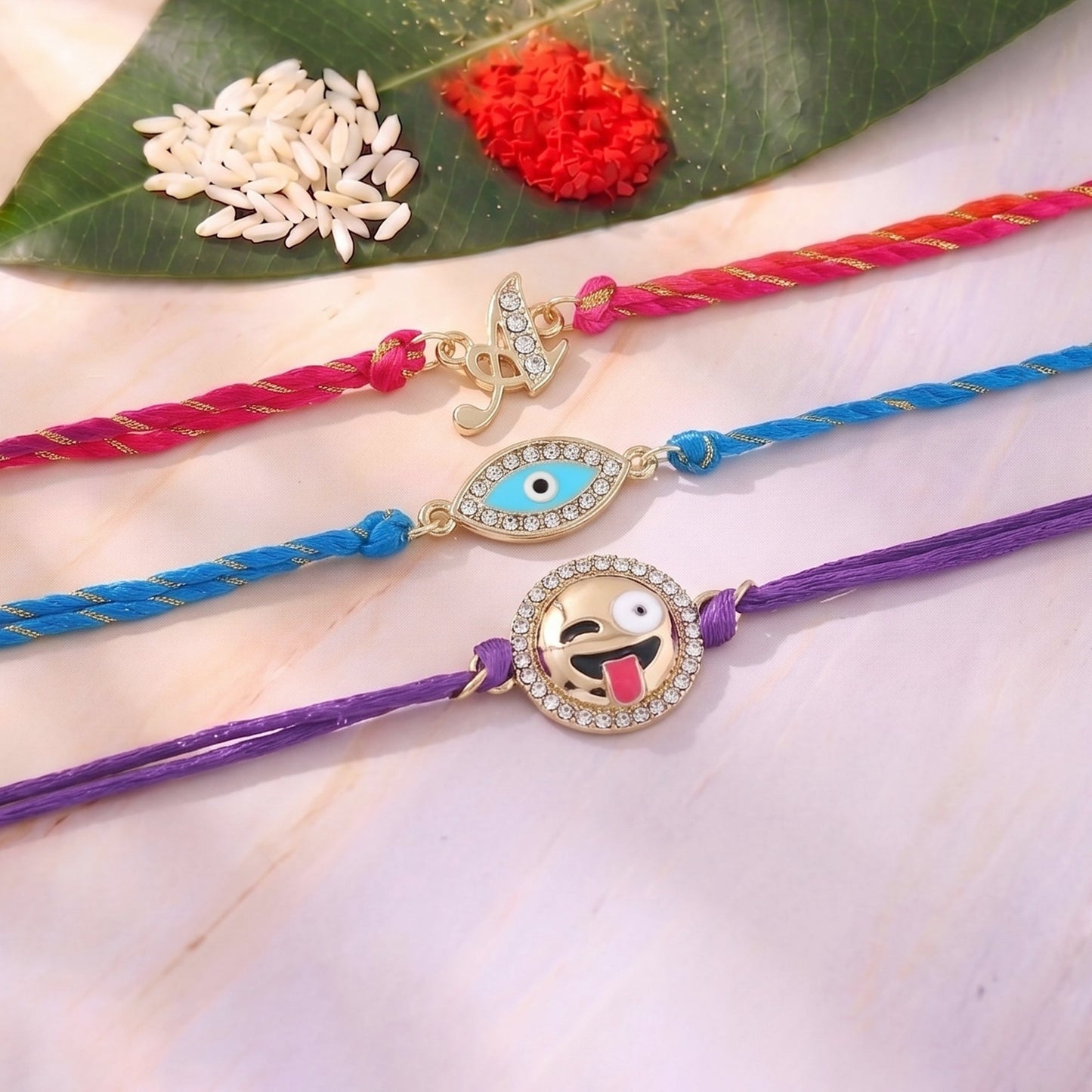 Gold Plated Emoji Alphabet Evil Combo Rakhi