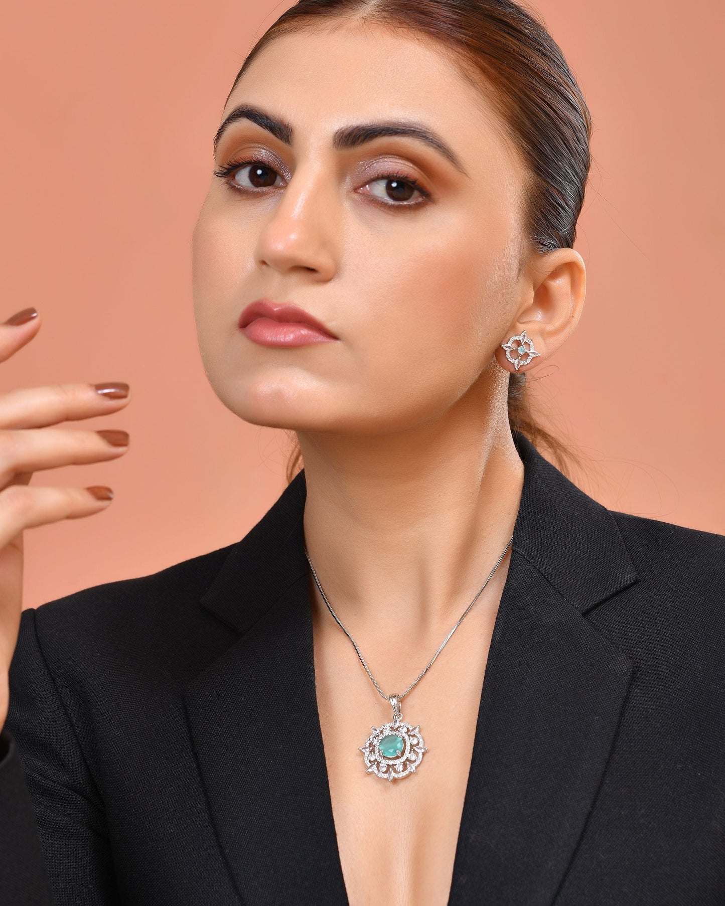 VOJ Silver Plated Sea Green Circulare Stone Studded Sun Shaped Ad Pendant With Chain Set