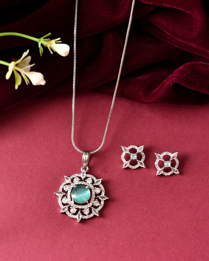 VOJ Silver Plated Sea Green Circulare Stone Studded Sun Shaped Ad Pendant With Chain Set
