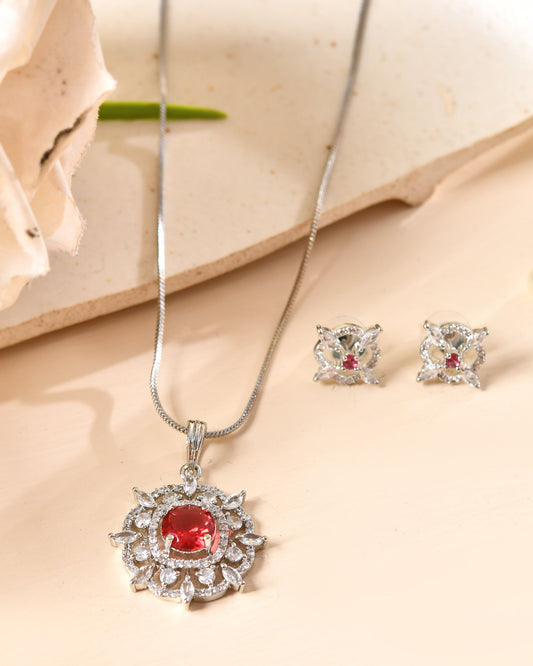 VOJ Silver Plated Ruby Red Circular Stone Studded Sun Shaped Ad Pendant With Chain Set