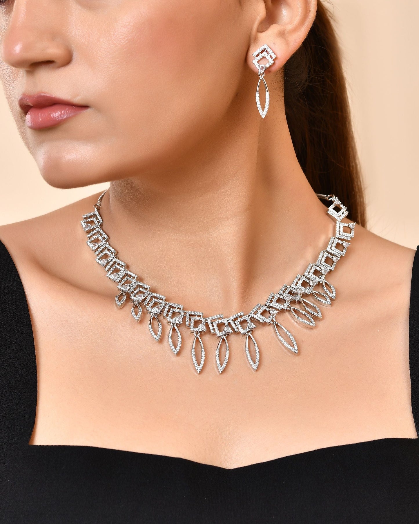 VOJ Silver Plated Ad Studded Square And Leaf Shaped Necklace Set