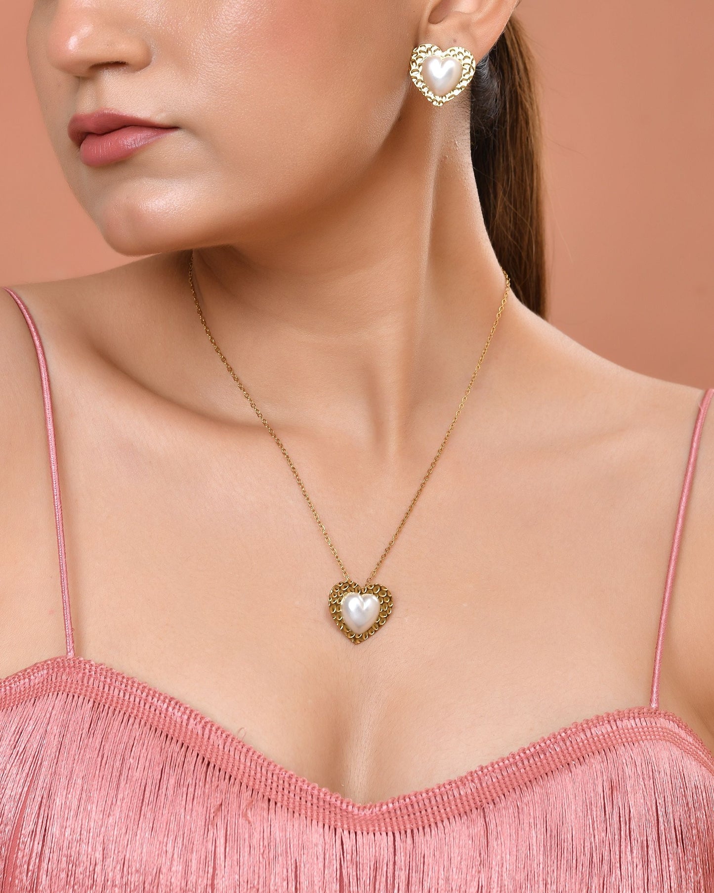VOJ Gold Toned Pearl Studded Heart Shaped Pendant And Earrings With Chain Set
