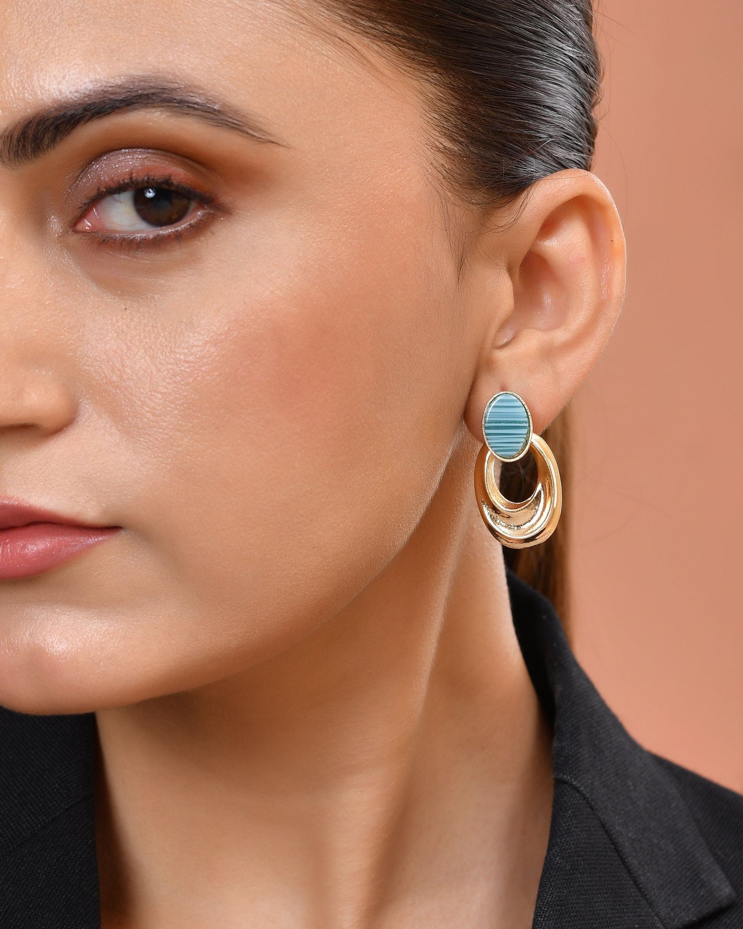 VOJ Gold Plated Blue Stone Studded Oval Shaped Earrings