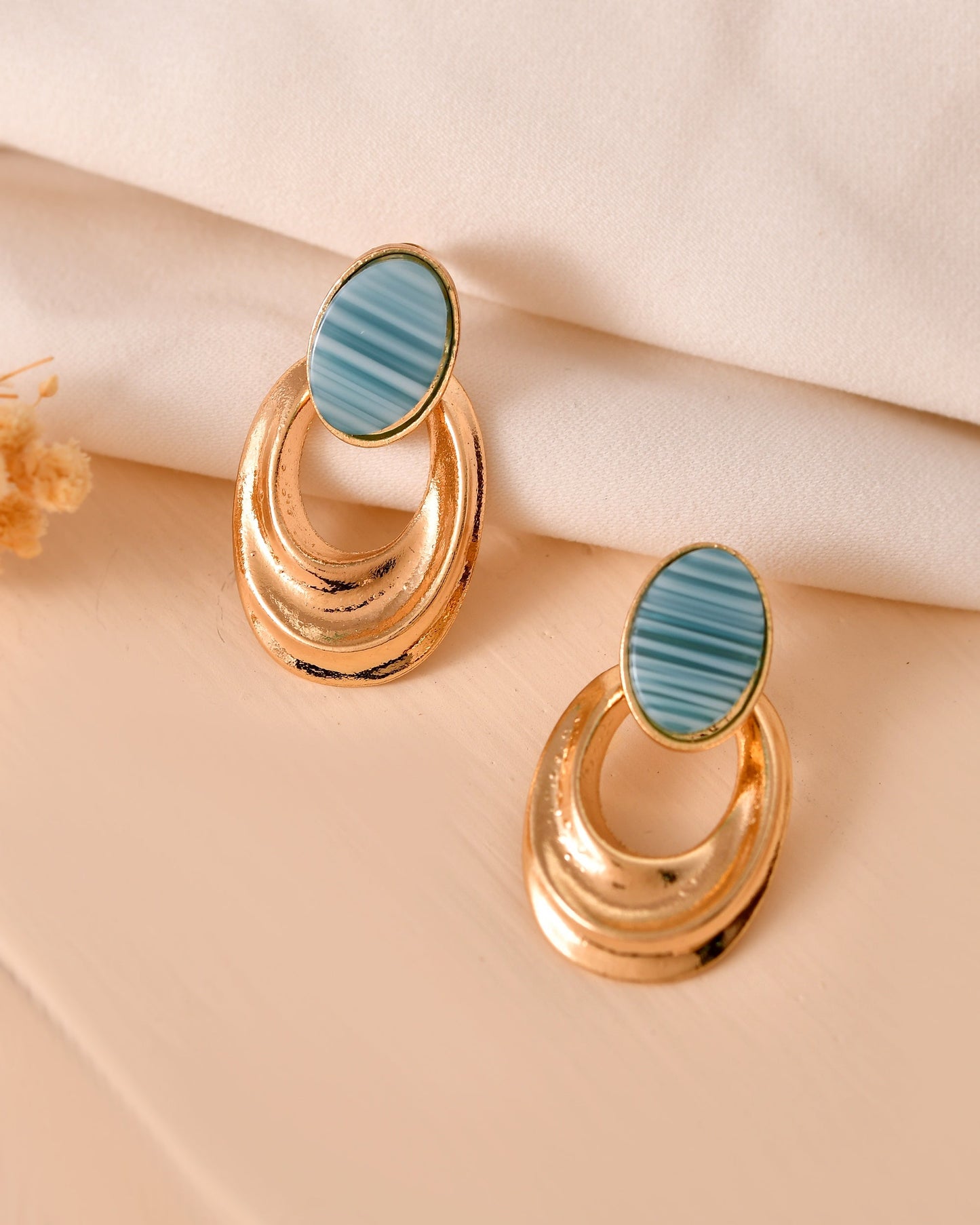 VOJ Gold Plated Blue Stone Studded Oval Shaped Earrings