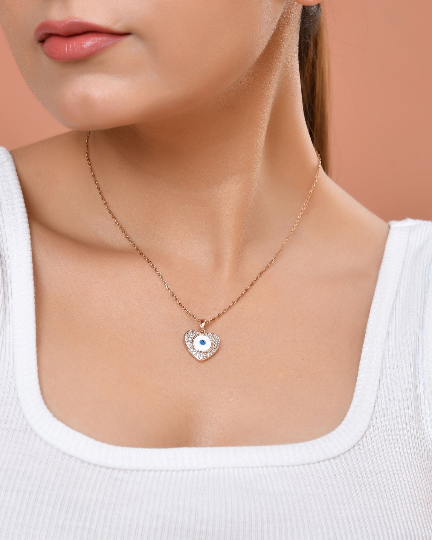 VOJ Gold Plated Heart Shaped Ad Stone Studded Evil Eye Pendant With Chain