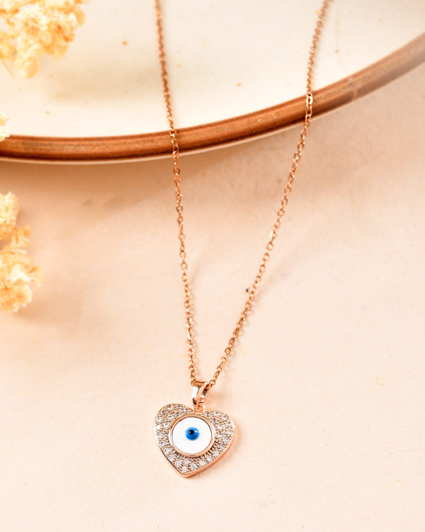 VOJ Gold Plated Heart Shaped Ad Stone Studded Evil Eye Pendant With Chain