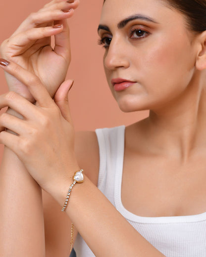 VOJ Gold Plated Ad Stone Studded With Heart Shaped Pearl Bracelet For Women