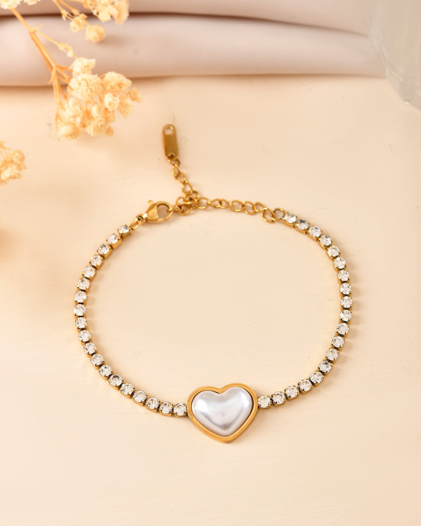 VOJ Gold Plated Ad Stone Studded With Heart Shaped Pearl Bracelet For Women