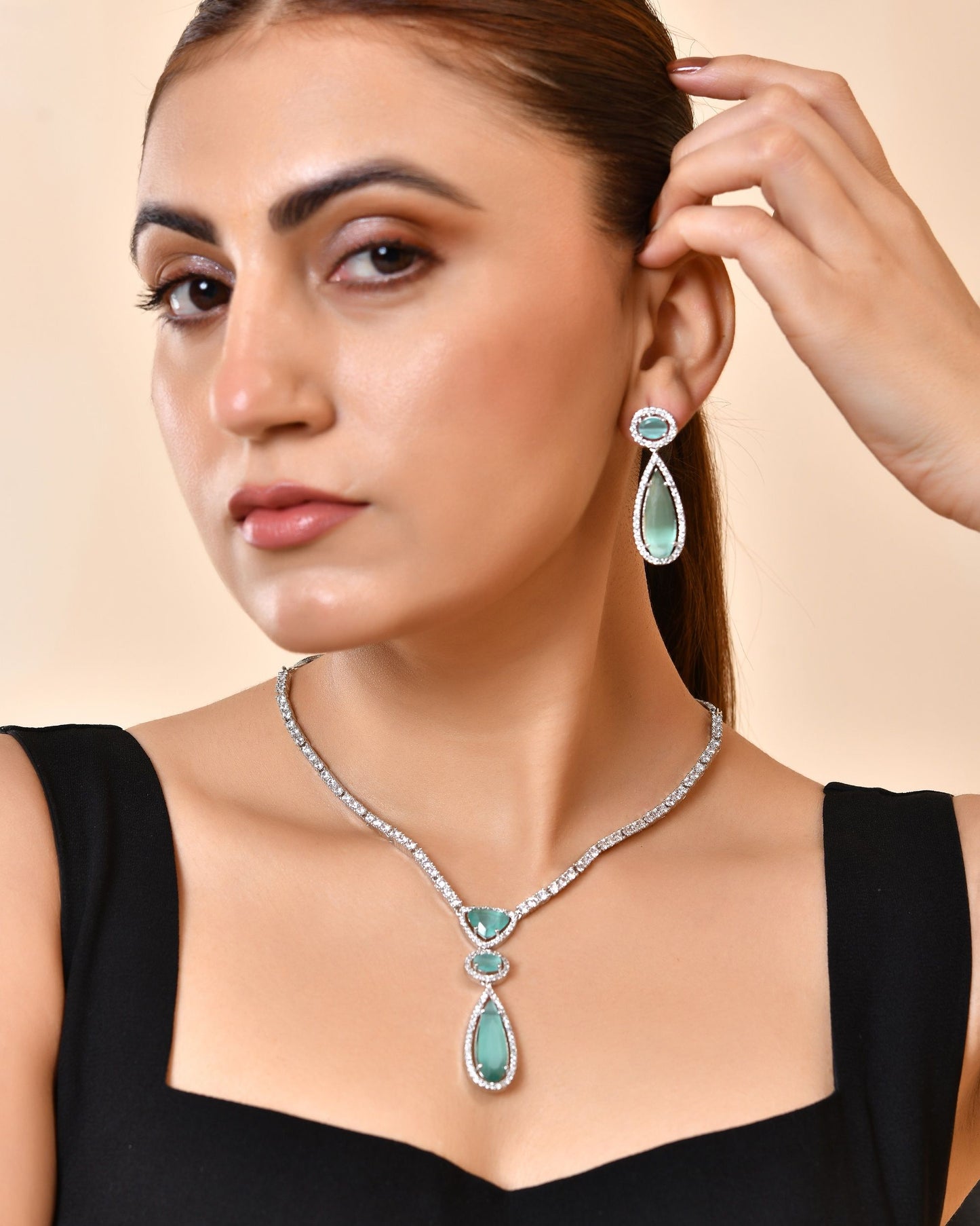 VOJ Silver-Plated Ad & Teal Green Cubic Zirconia Studded Jewellery Set