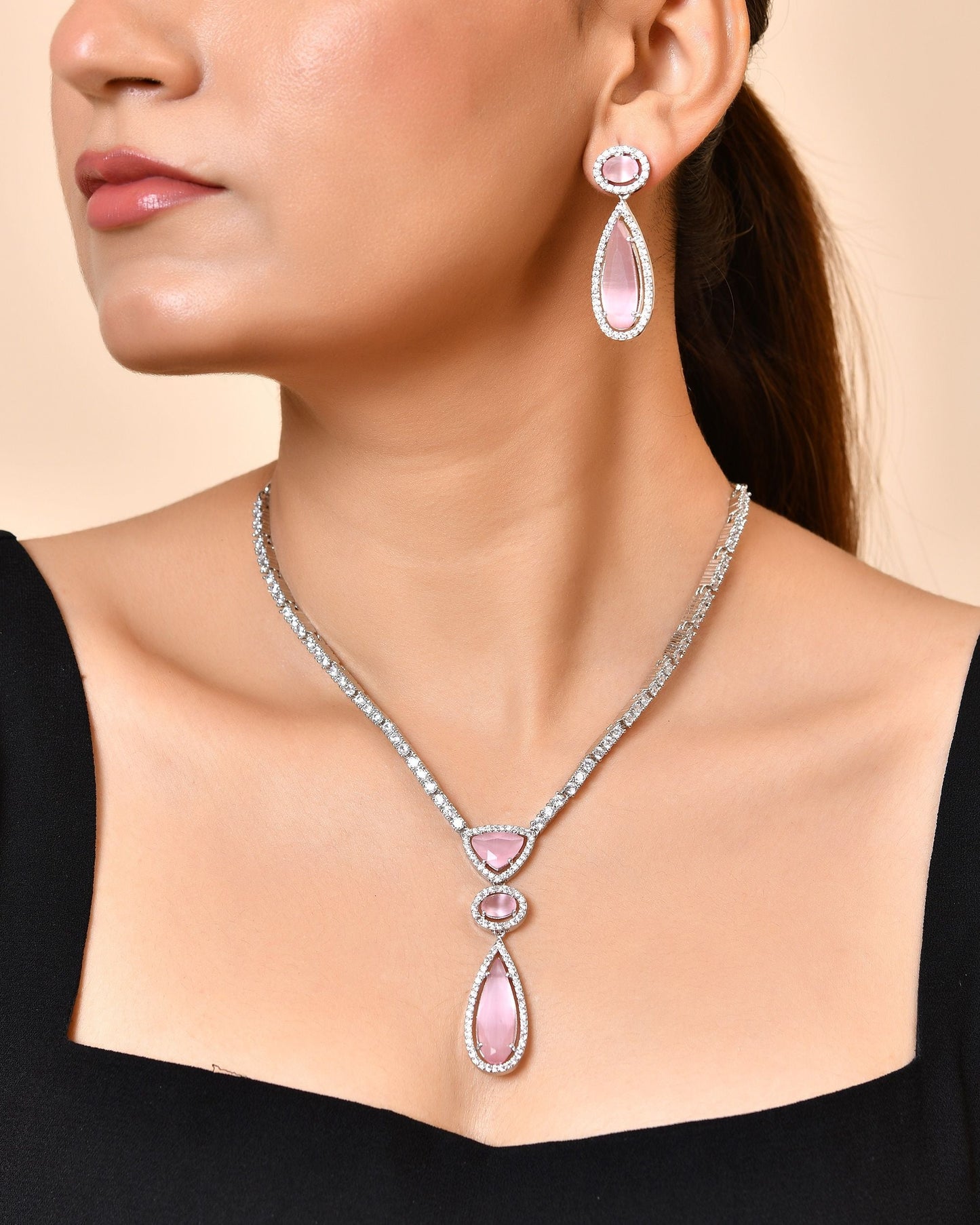 VOJ Silver-Plated Ad & Baby Pink Cubic Zirconia Studded Jewellery Set