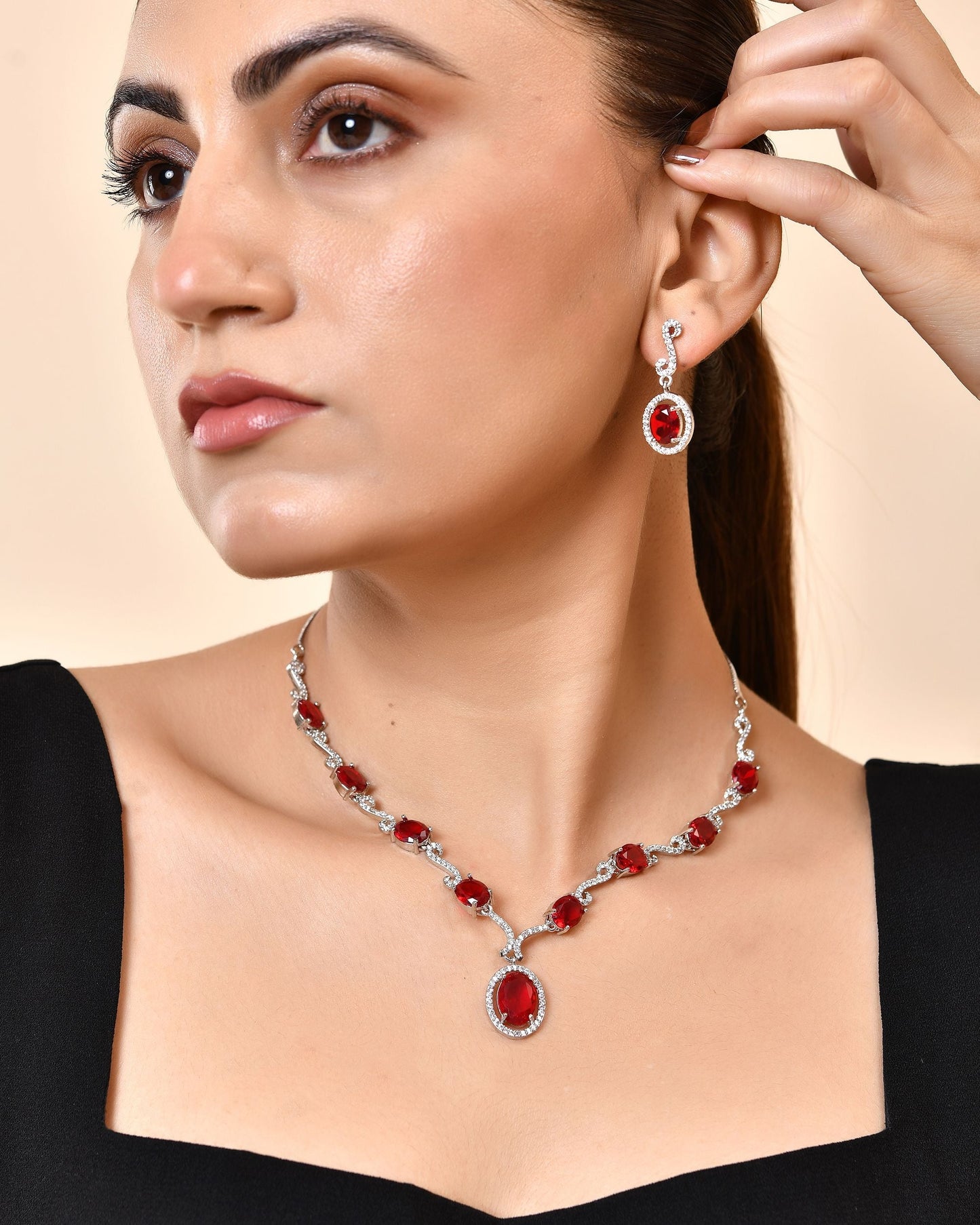 VOJ Silver Plated Oval Ruby Red Stone Studded Ad Jewellery Set