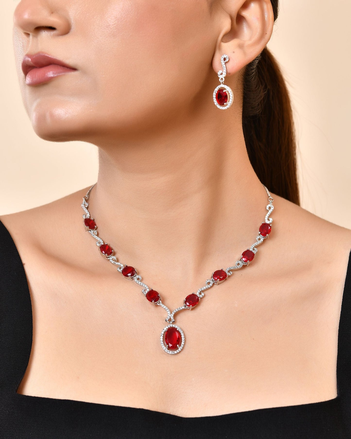 VOJ Silver Plated Oval Ruby Red Stone Studded Ad Jewellery Set