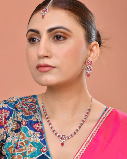 VOJ Silver Plated Ruby Red Stone Studded Ad Jewellery Set With Maang Tikka