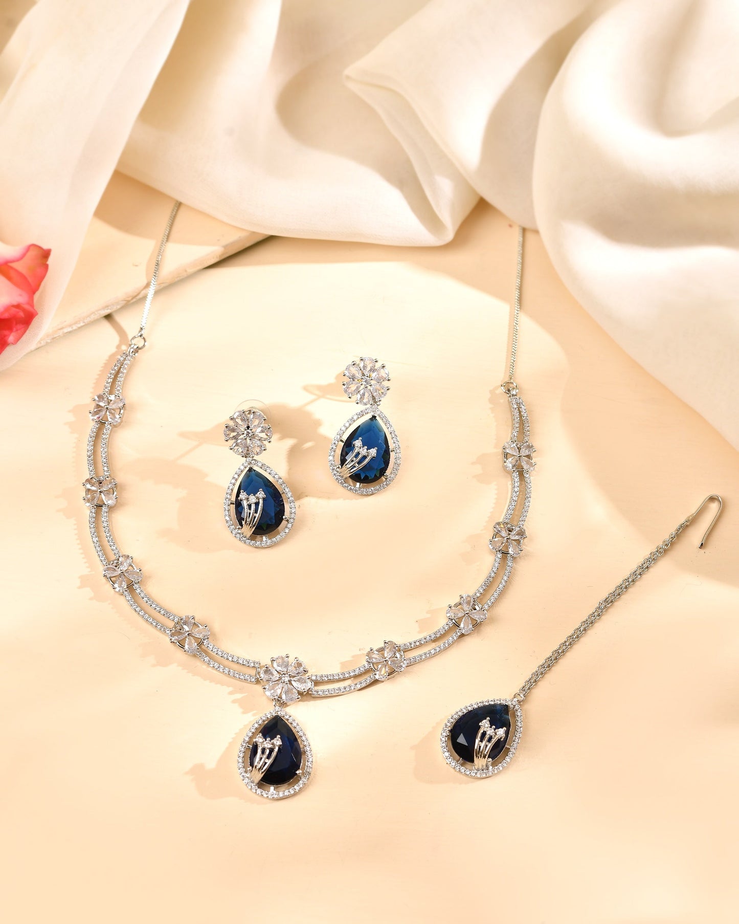 VOJ Silver Plated Blue Tear Drop Shaped Stone And Ad Stone Jewellery Set With Maang Tikka