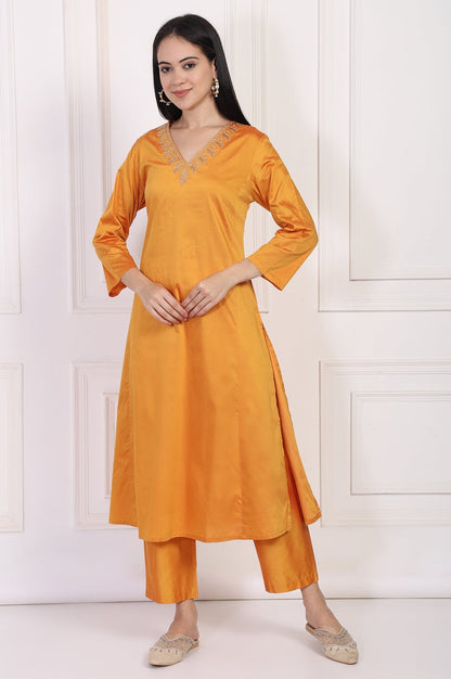 W for Woman Orange Embroidered Flared Satin Kurta with Straight Pant Set