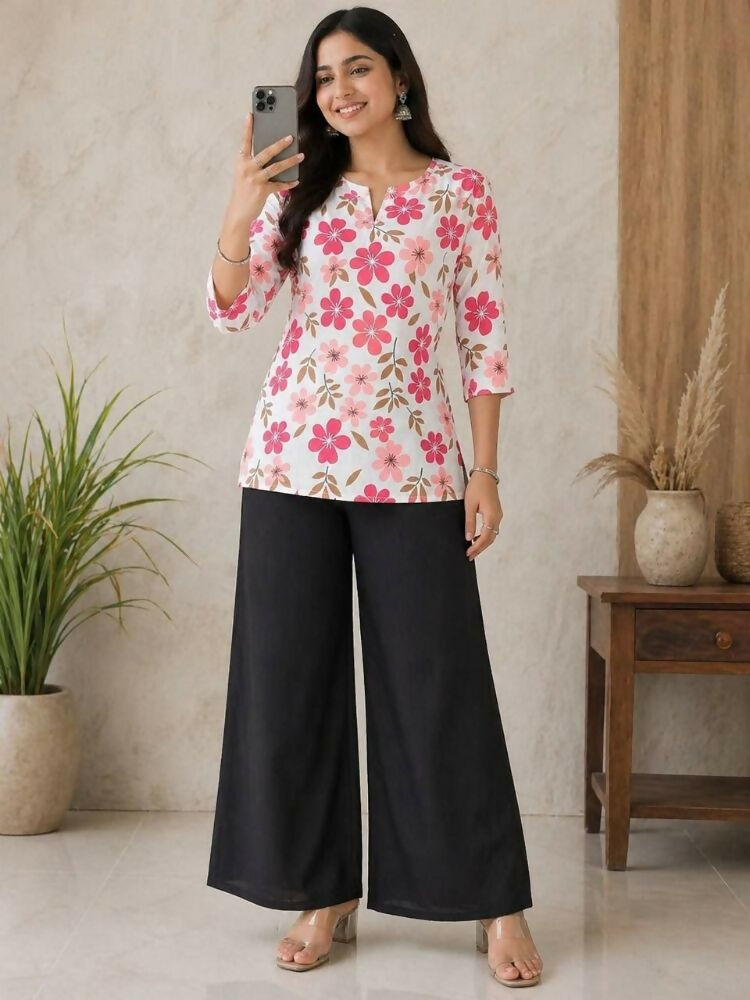 Teeya Creation Women White & Rani Pink Bold Floral Printed Cotton Kurti with Black Wide-Leg Palazzo Set