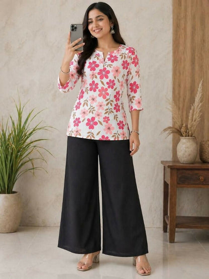 Teeya Creation Women White & Rani Pink Bold Floral Printed Cotton Kurti with Black Wide-Leg Palazzo Set