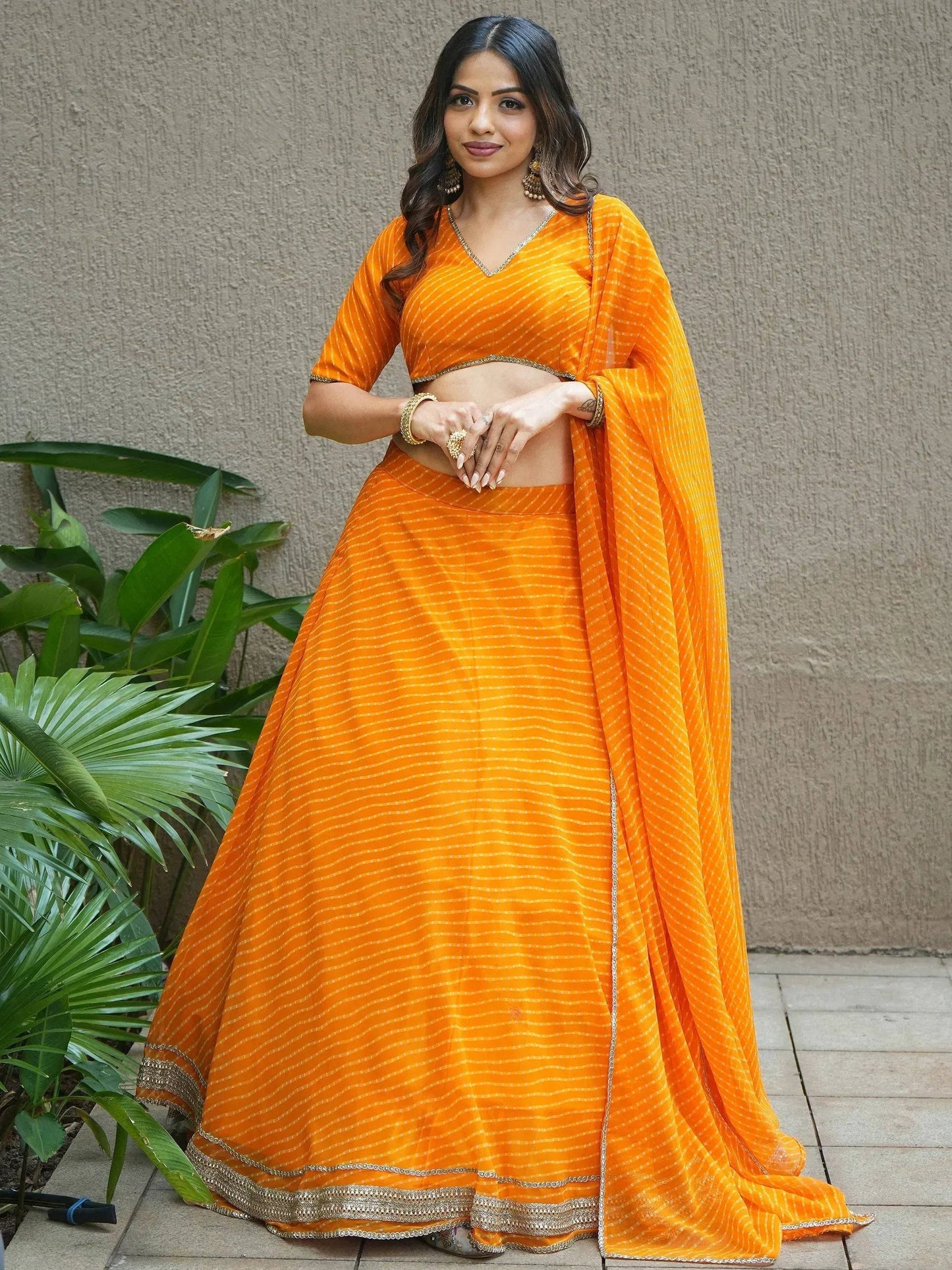 Tulsi Art Amazing Orange Leheriya Print Georgette Haldi Wear Lehenga Choli