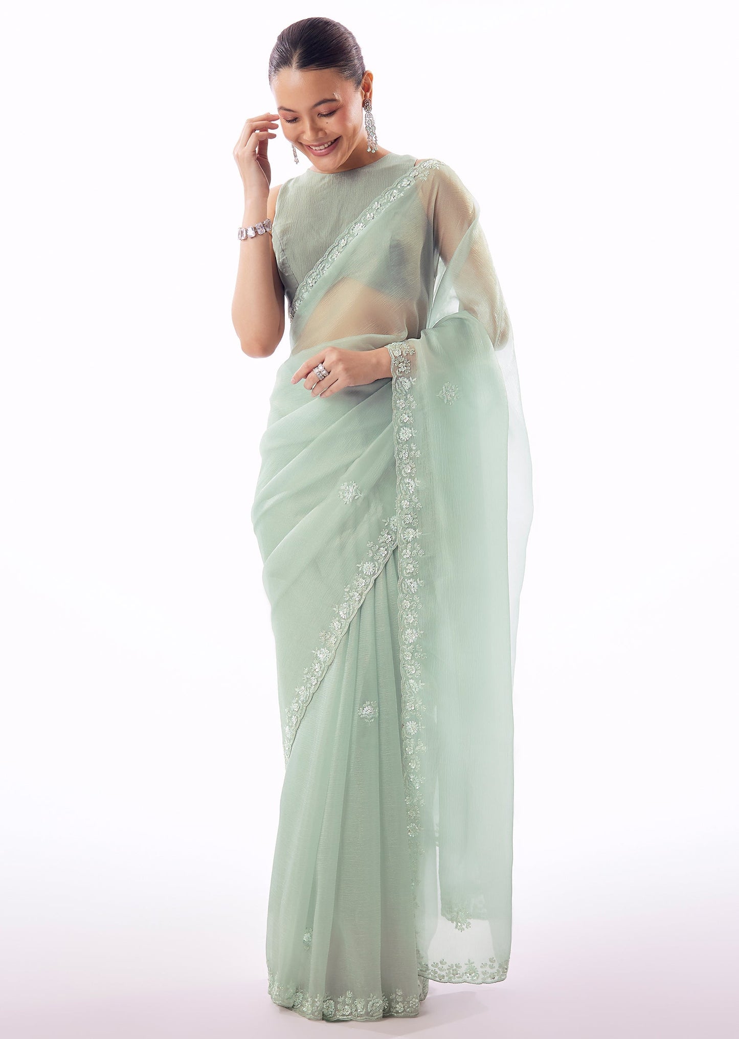 Aqua Blue Crush Tissue Saree With Hand Embroidered Cutdana Sequin Bead Border