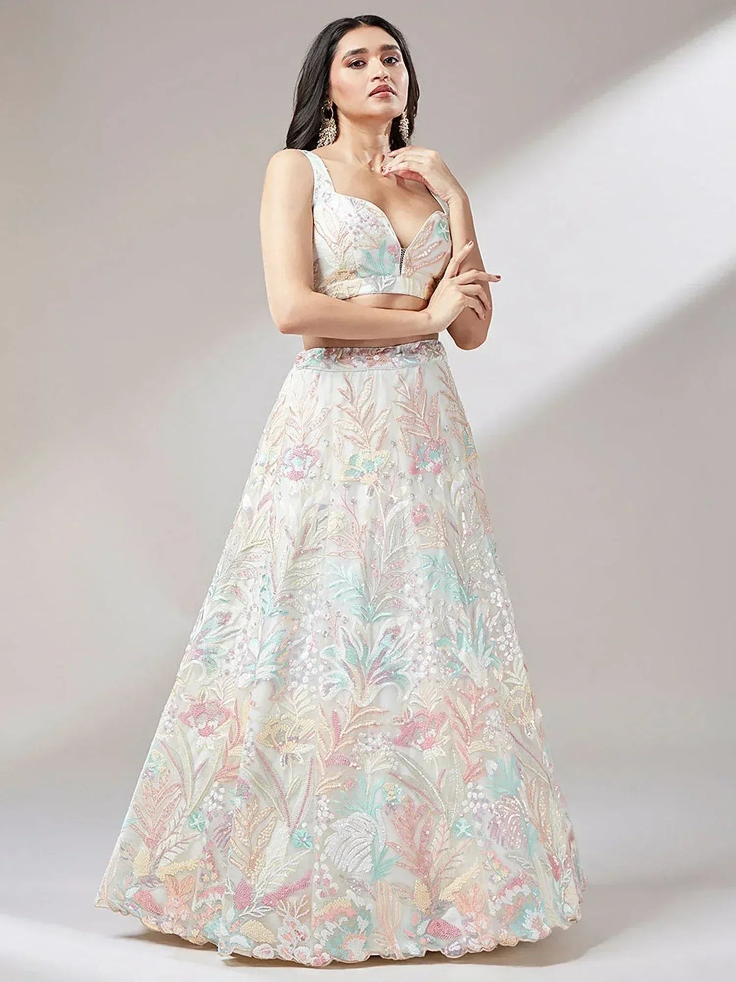 Tulsi Art Astounding Off-White Sequins Soft Net Wedding Wear Lehenga Choli