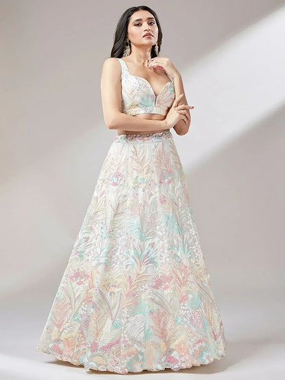 Tulsi Art Astounding Off-White Sequins Soft Net Wedding Wear Lehenga Choli