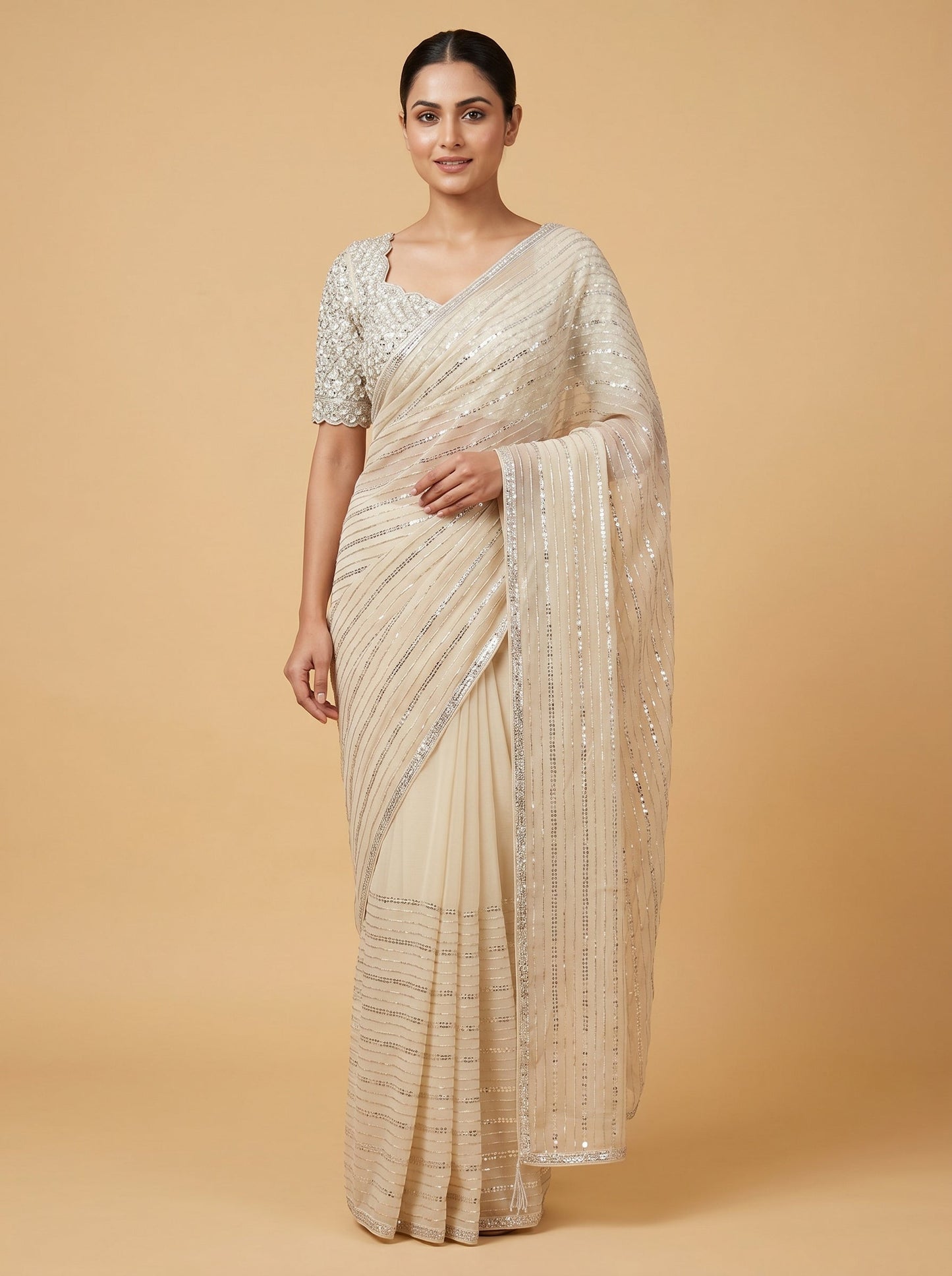 Beige embroidered saree with classic design