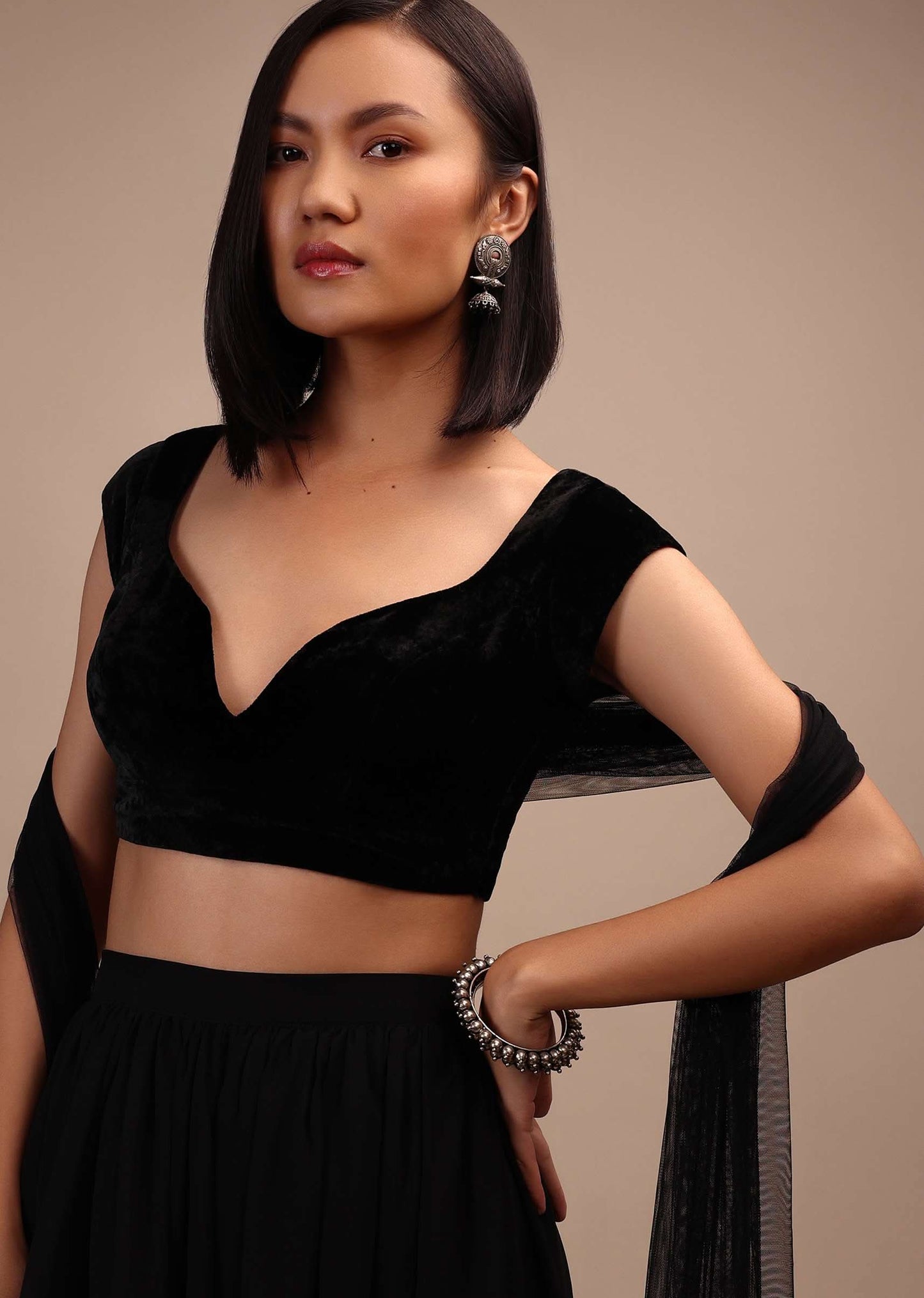 Black Cap Sleeves Blouse With A Sweetheart Neckline Straight Hem Cut With Tie-Up Tassle Dori At The Back