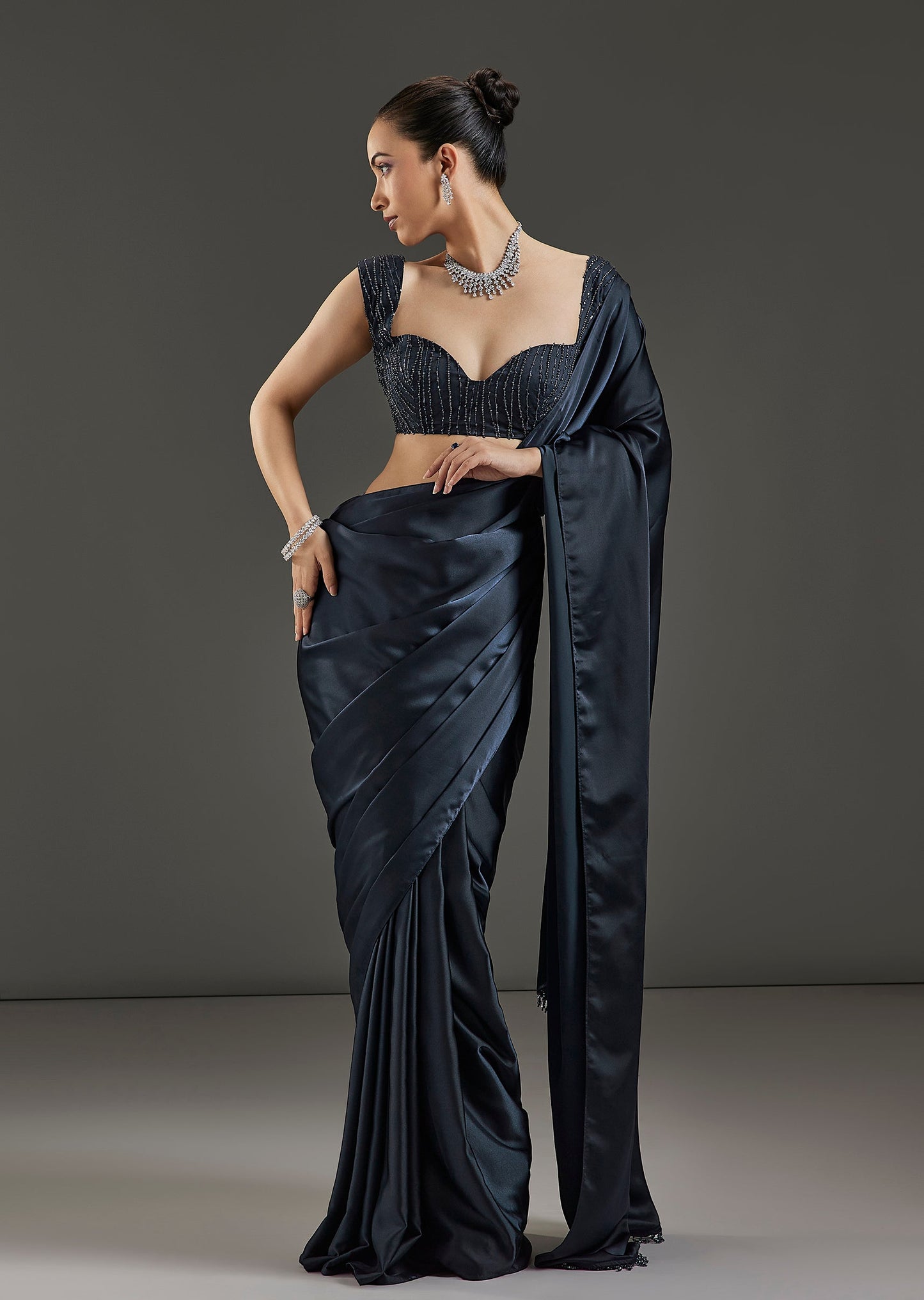 Blue Satin Blend Ready Pleated Saree With Embellished Halter Neck Lace Up Blouse