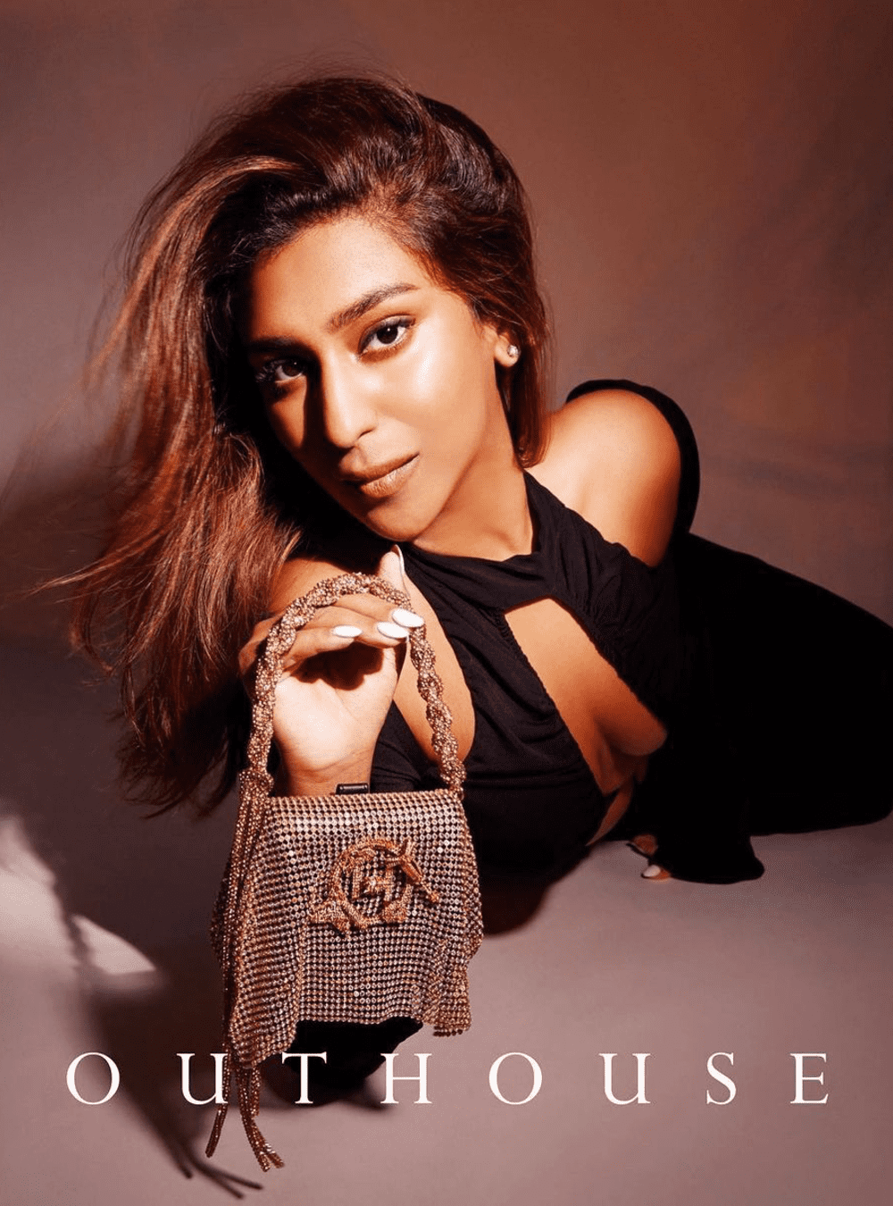 Sasha Jairam Wearing Gold Rush Crystal Furbie Handbag