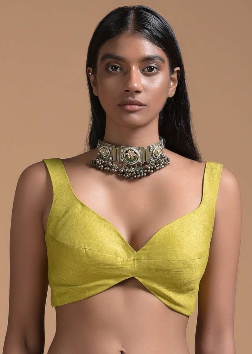 Corn Yellow Sleeveless Blouse In Tussar silk With Sweetheart Neckline And Curved Hem