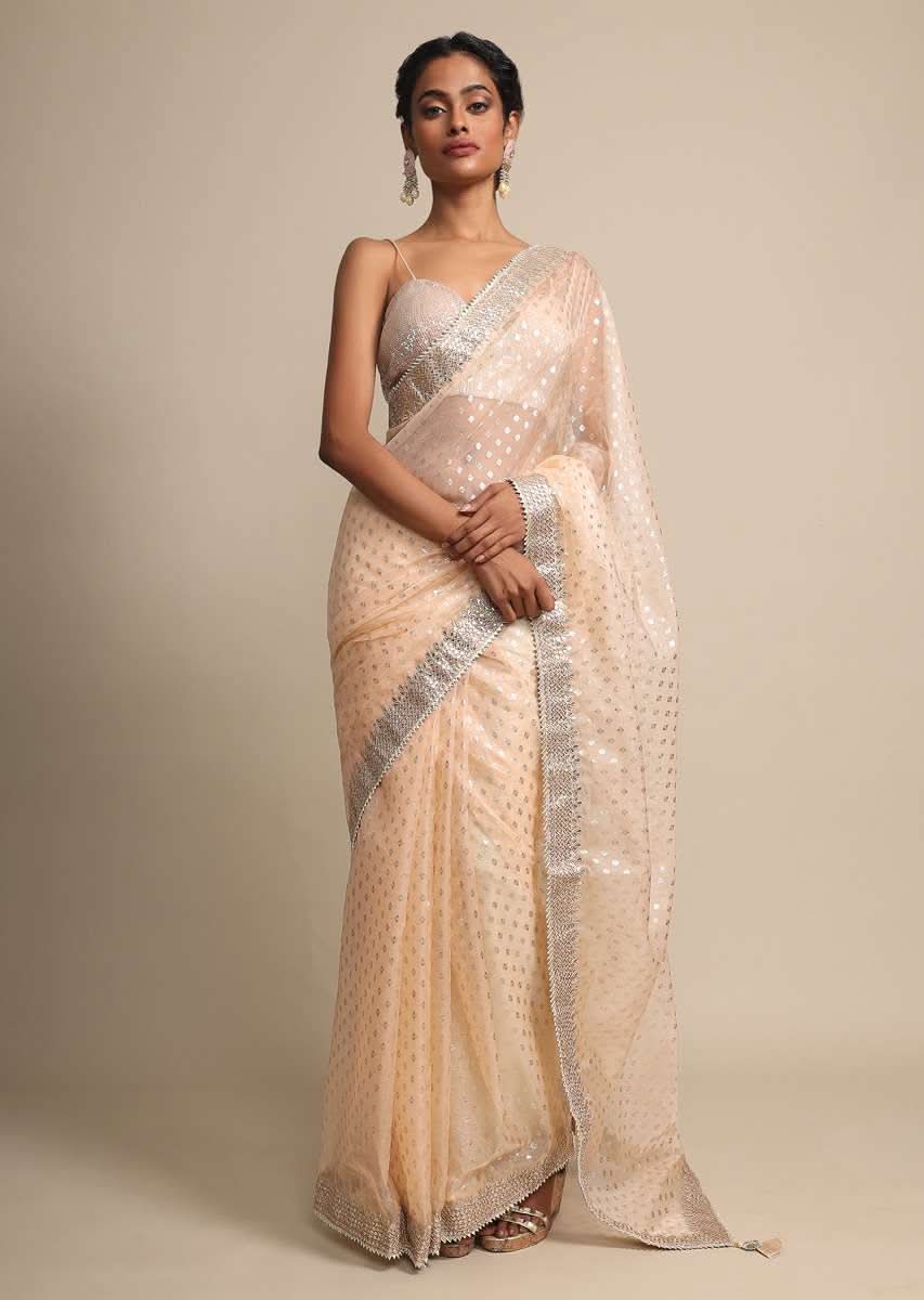 Foil Printed Peach Organza Saree With Gotta Embroidered Border