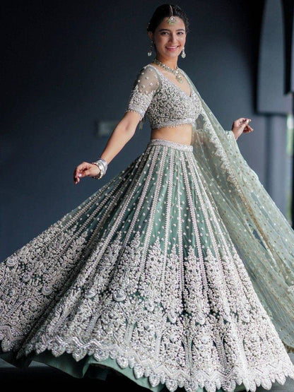 Tulsi Art Alluring Green Sequins Net Engagement Wear Lehenga Choli With Dupatta
